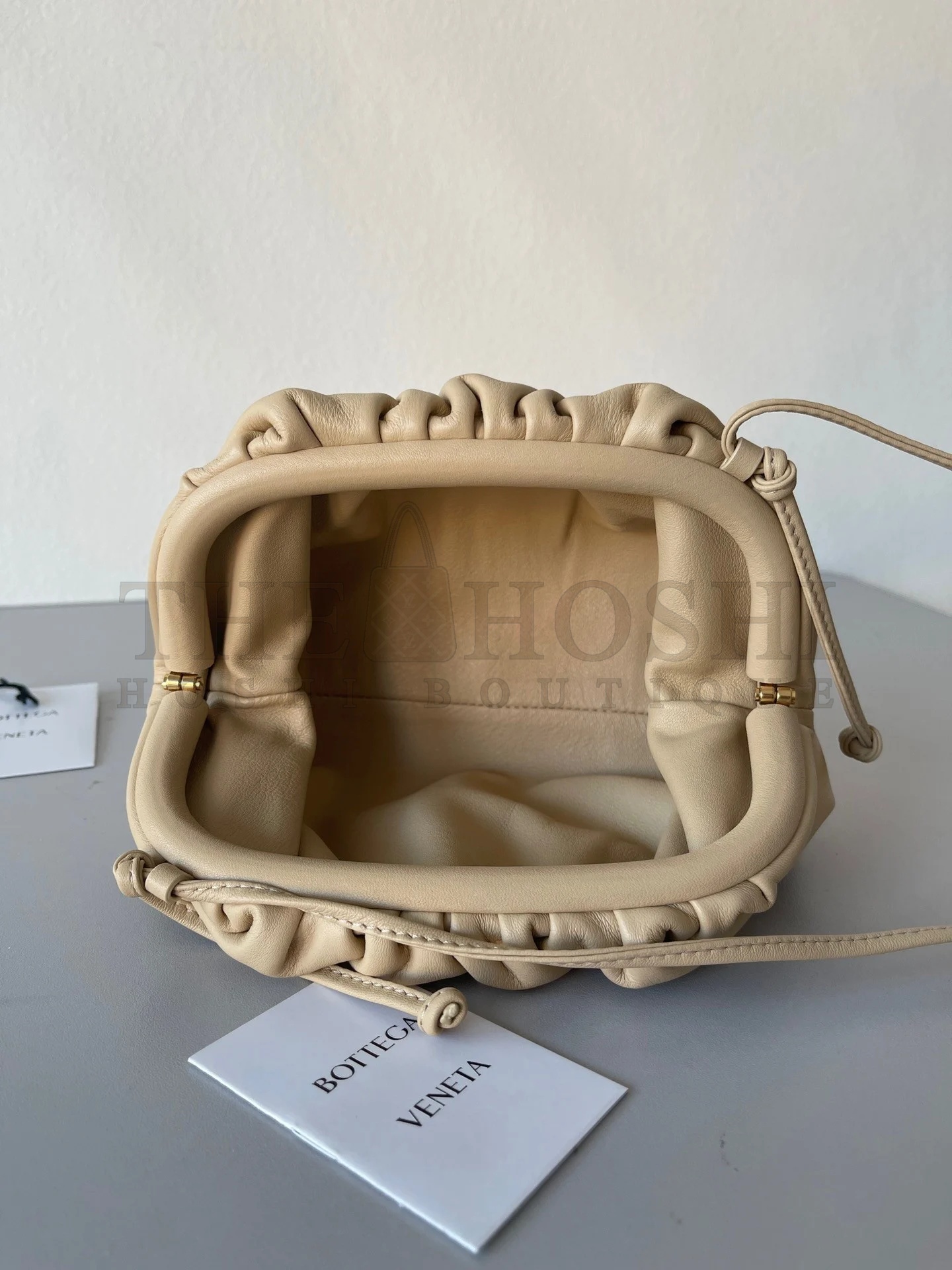 B0tt*ga Ven*ta Mini Pouch with Strap in Almond Calfskin Master Quality