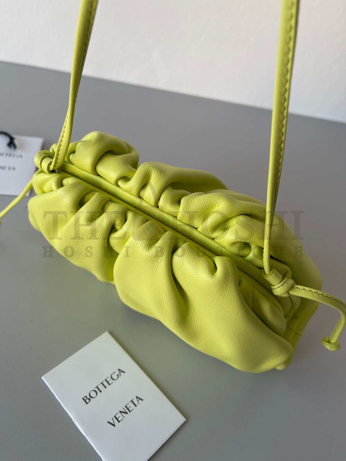 B0tt*ga Ven*ta Mini Pouch with Strap in Kiwi Calfskin Master Quality