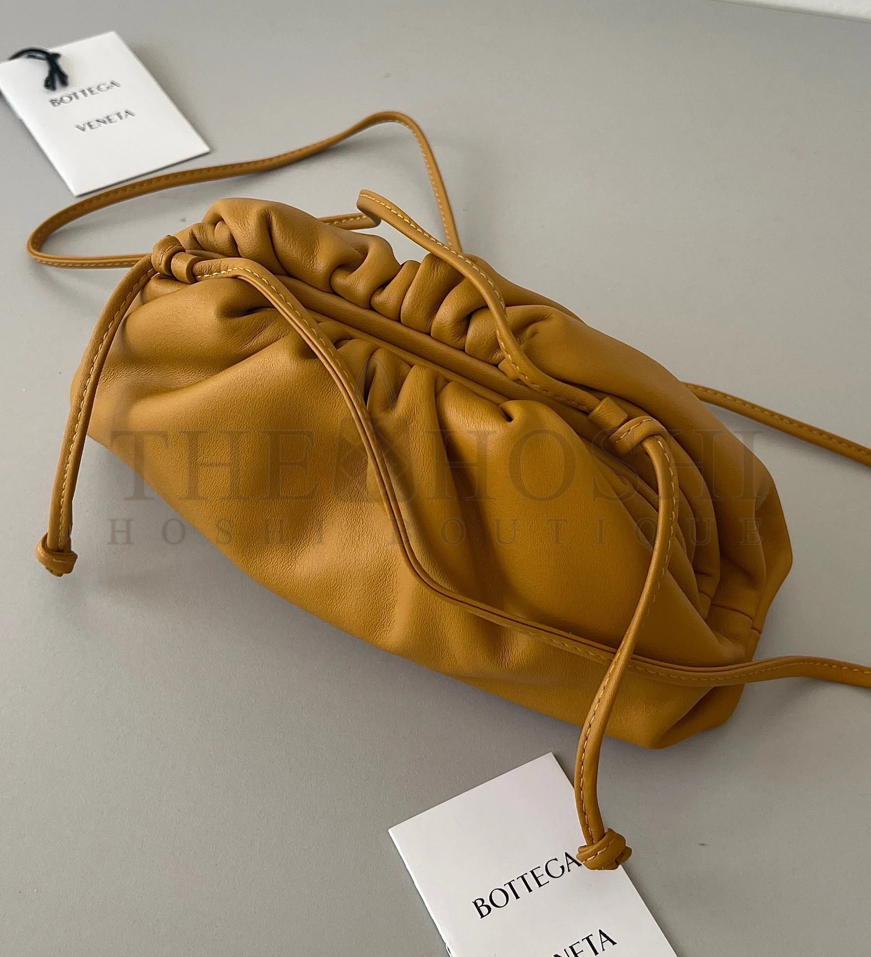 B0tt*ga Ven*ta Mini Pouch with Strap in Teak Calfskin Master Quality
