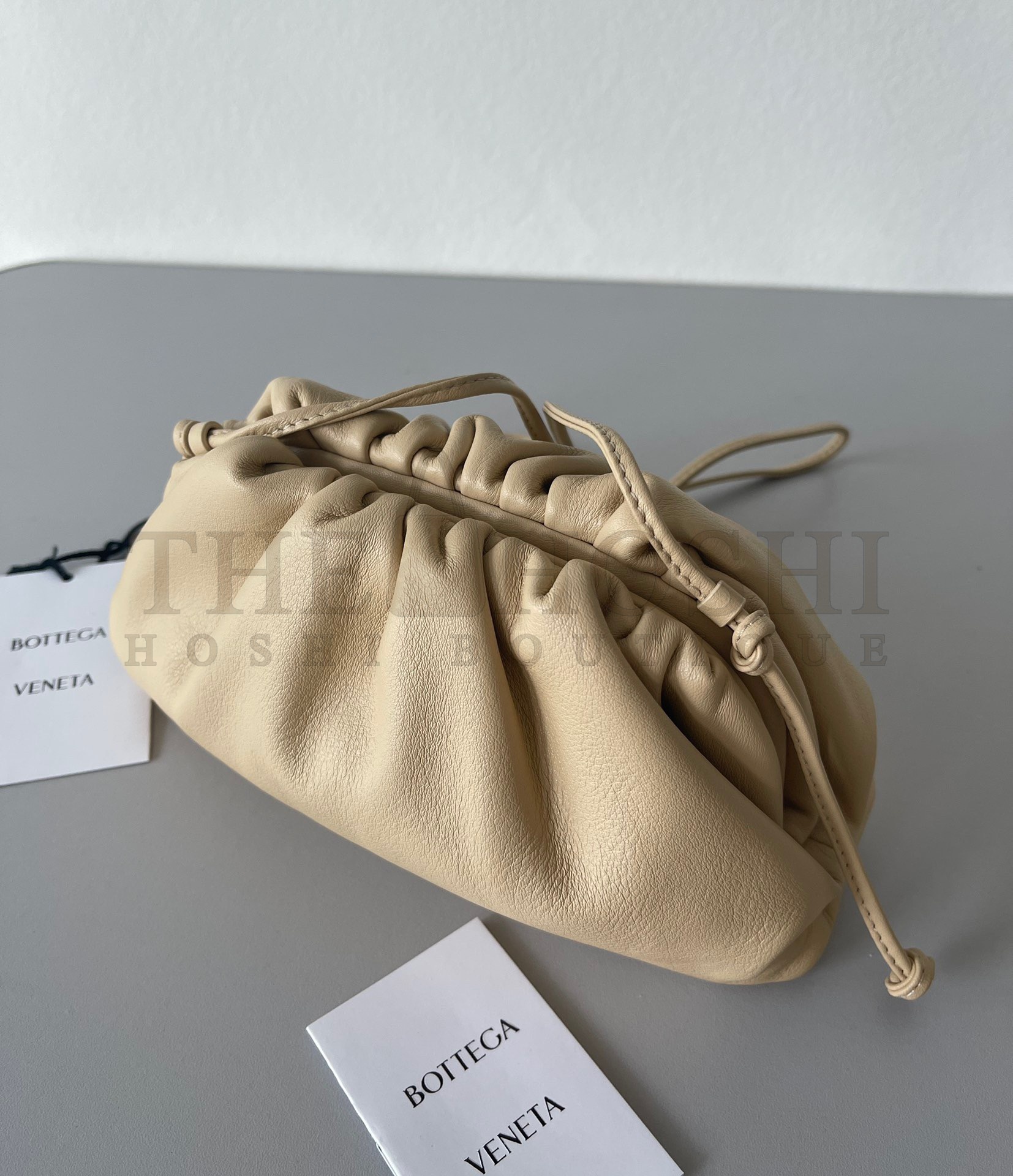 B0tt*ga Ven*ta Mini Pouch with Strap in Almond Calfskin Master Quality